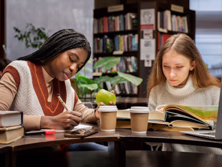 Two women reading books